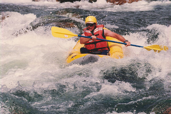 Paul kayaking on the Salmon River (Sawtooth Photography)