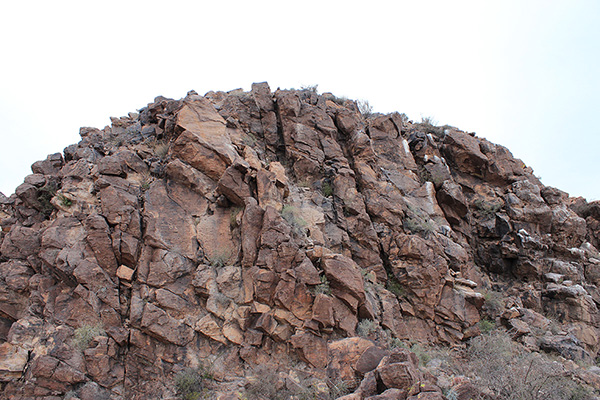 The east face of the summit block; the route up starts right of center and diagonals up to the left