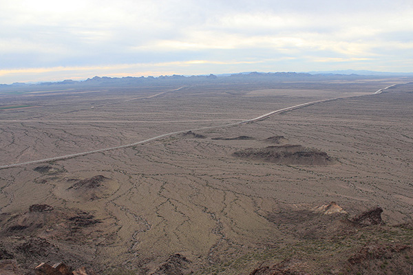 The summit view of the Hayden-Rhodes Aqueduct, my Jeep, and the distant Eagletail Mountains