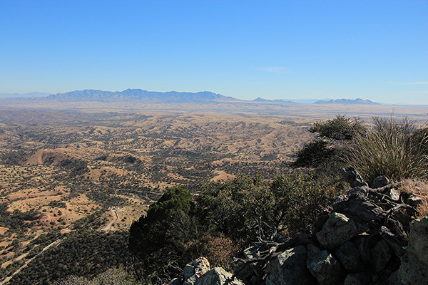 To the east lie the Whetstone Mountains on the left and the Mustang Mountains to the right